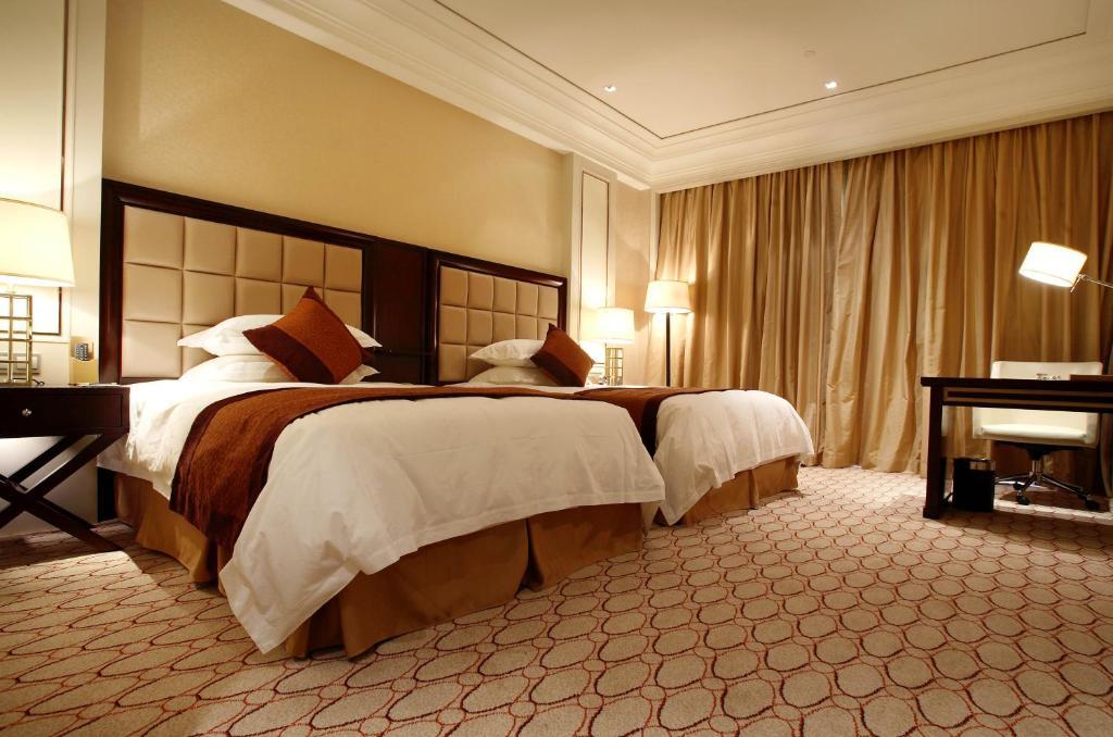 Landison Green Town Hotel Xinchang الغرفة الصورة