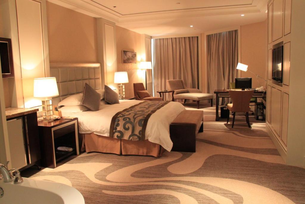 Landison Green Town Hotel Xinchang الغرفة الصورة
